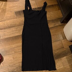 Reformation black ribbed dress with side slit
